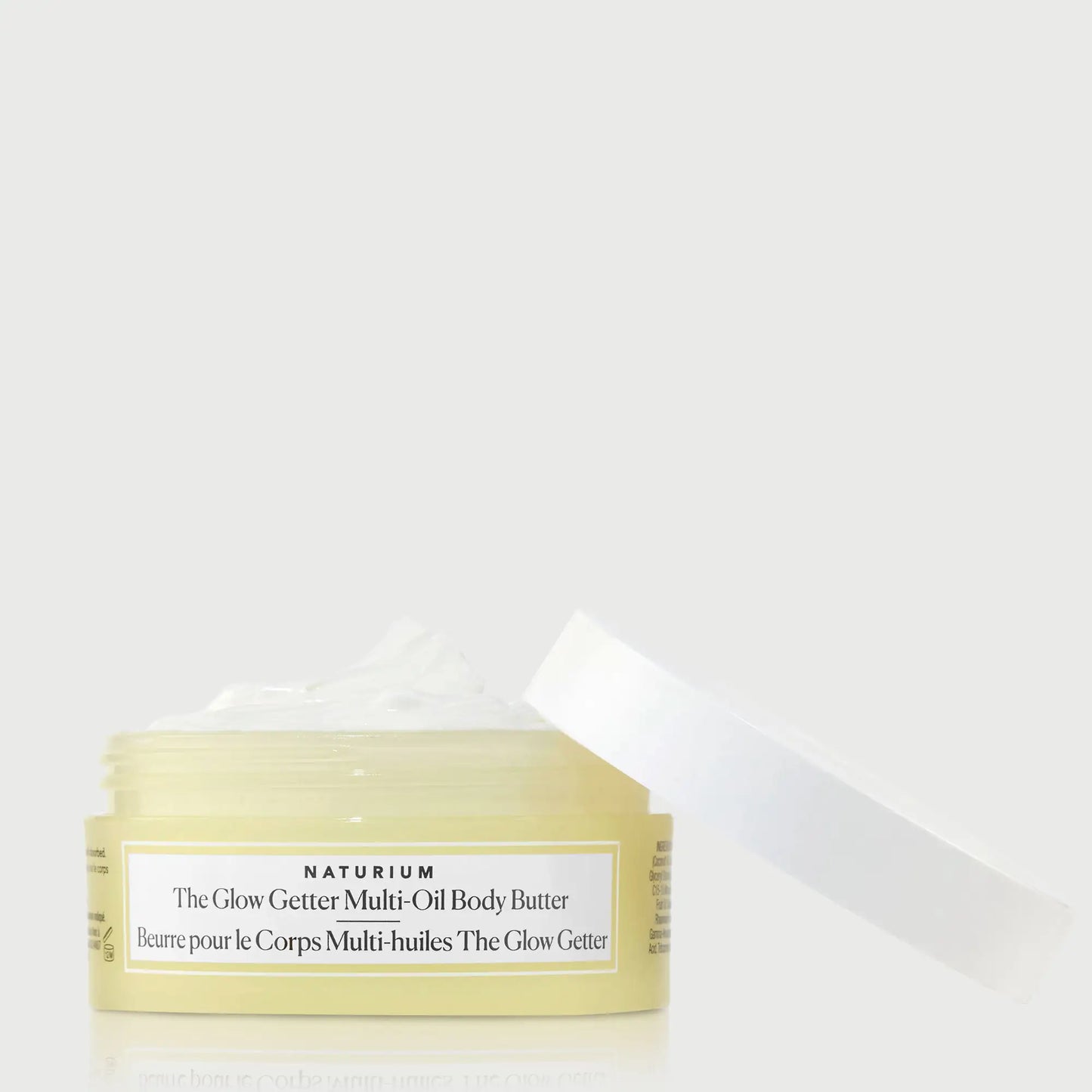 the-glow-getter-multi-oil-body-butter-travel-size-v9 NATR-40115_Glow-Getter-Body-Butter-Mini_front_capoff_bonebkgd.webp