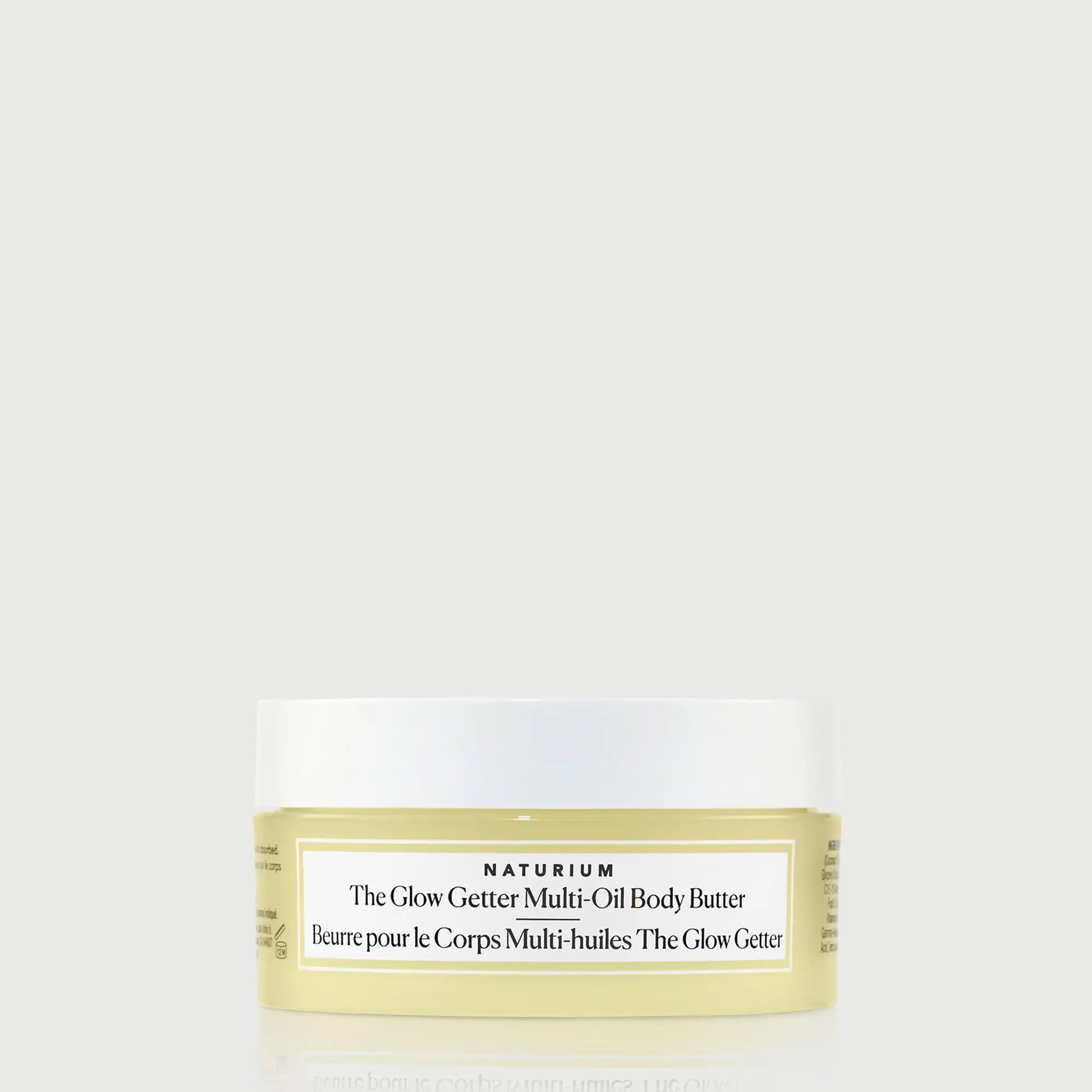 the-glow-getter-multi-oil-body-butter-travel-size-v9 NATR-40115_Glow-Getter-Body-Butter-Mini_front_capon_bonebkgd.webp