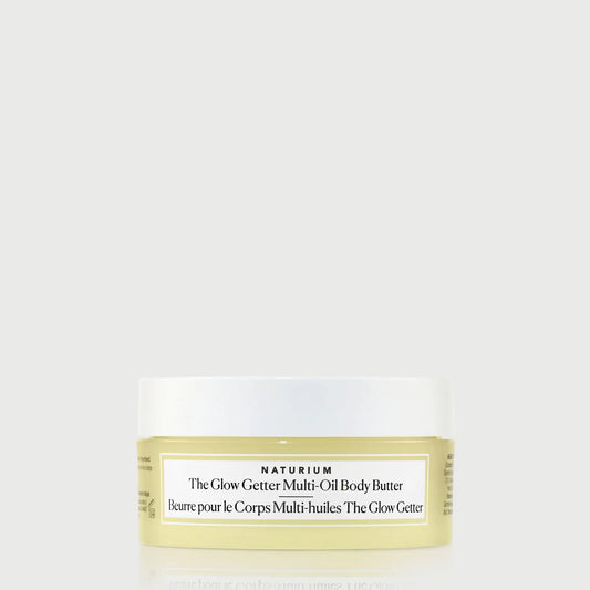 the-glow-getter-multi-oil-body-butter-travel-size-v9 NATR-40115_Glow-Getter-Body-Butter-Mini_front_capon_bonebkgd.webp