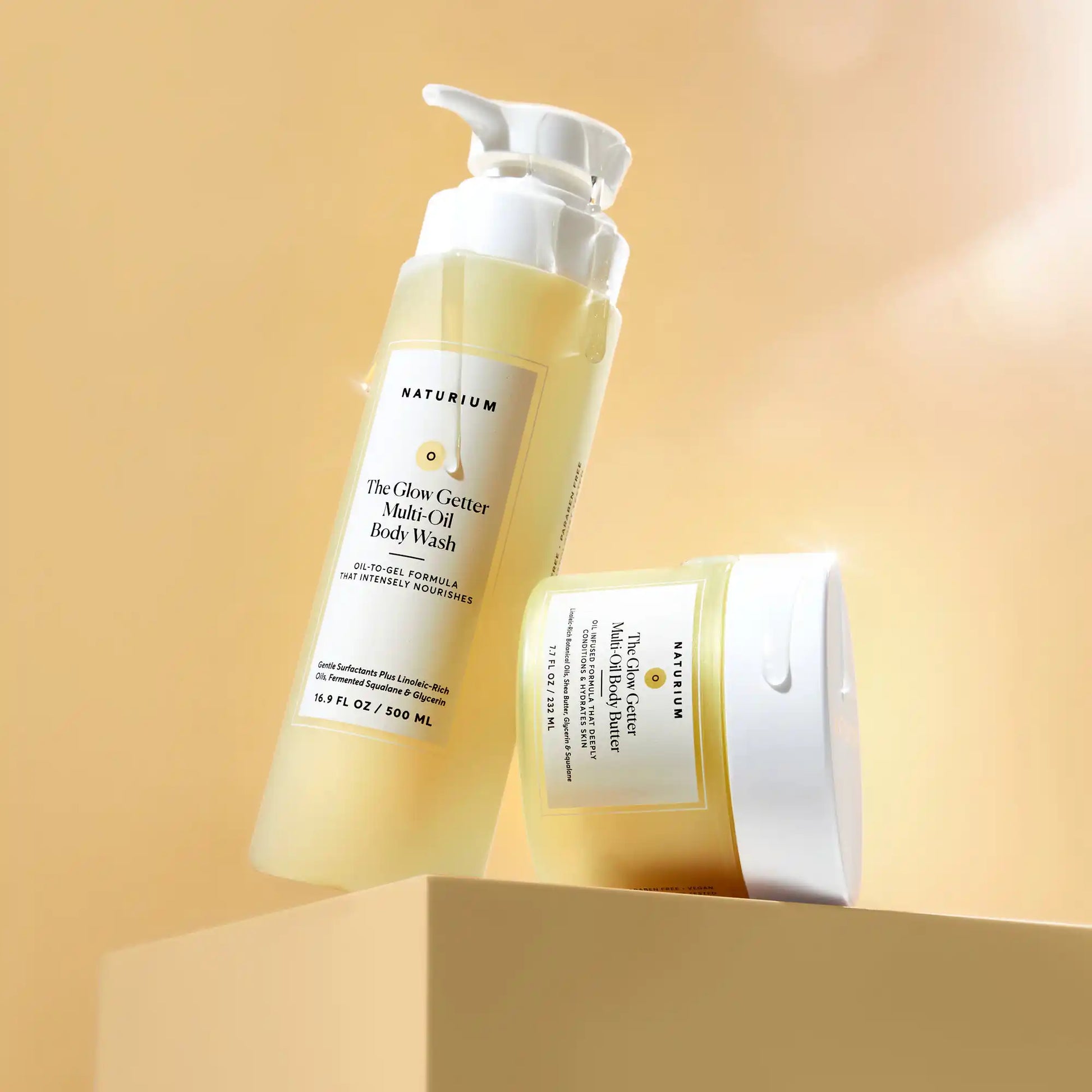 the-glow-all-out-body-bundle-h5 gg-bodybutter_1464-crop_revcolor_FL.webp